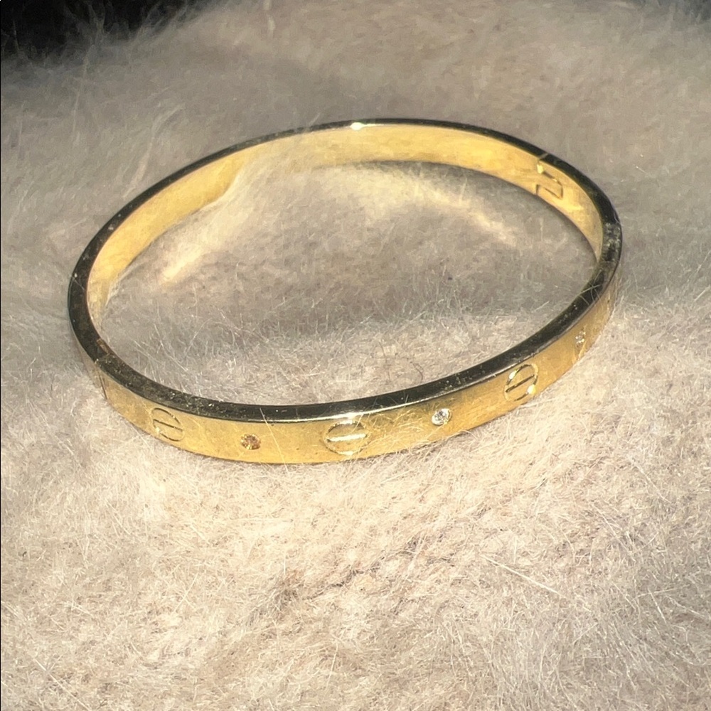 Love gold bracelet with jewels